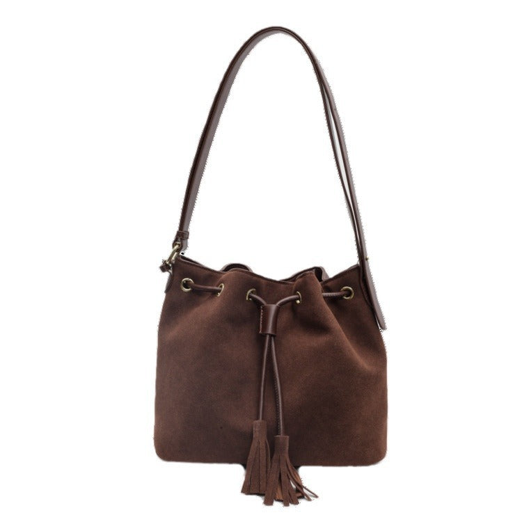 Ivory™ Bucket Bag with Tassel